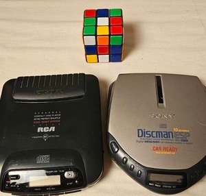 lot 161 image: Rubix Game and Portable CD Players