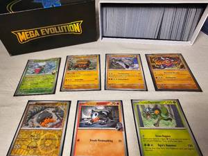 lot 203 image: Pokemon Mega Evolution Trainer Box, (7) in Sleeves