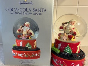 lot 60 image: CocaCola Santa, Musical Snow Globe w Train, Winds up and Train Circles the Globe