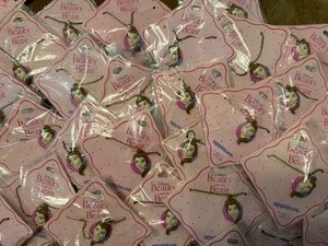 lot 70 image: Disneys Beauty and the Beast, 29 Necklaces w Belle Charms, Wrapped in Plastic