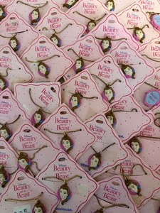 lot 71 image: Disneys Beauty and the Beast Necklaces, 91 w Belle Charms, 10 w Lockets, 101 Total