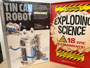 lot 74 image: Tin Can Robot (sealed) and Exploding Science (appears new) Kits
