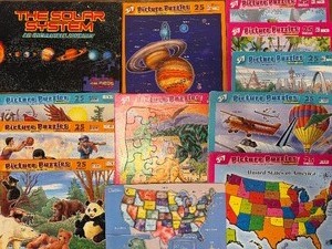 lot 102 image: Childrens Puzzles, The Solar System and More
