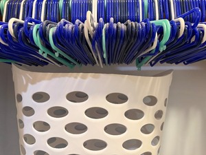 lot 106 image: Child-Sized Hangers (100) in a White Hamper