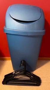 lot 110 image: Lidded Trash Can and Black Hangers
