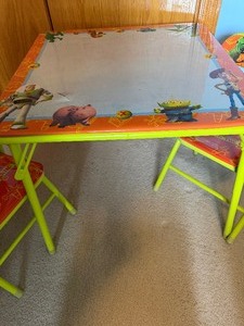 lot 124 image: Child-Sized Table and Chairs, Buzz, Woody and the Gang w a Bonus Blue Chair, Please See Pictures