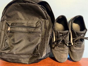 lot 139 image: Black Backpack and Vans Size 10.5
