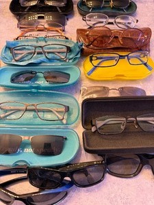 lot 153 image: Prescription Glasses and Cases