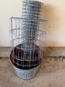 lot 412 image: Galvanized Bucket and Some Wire Fence