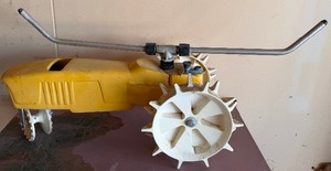 lot 421 image: Nelson Rain Train Cast Iron Traveling Lawn Sprinkler