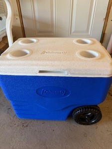 lot 452 image: Coleman Rolling Cooler, Very Clean and a Sleeping Bag