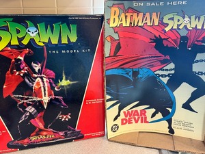 lot 459 image: Spawn Model (New) and Small MovieComic Posters