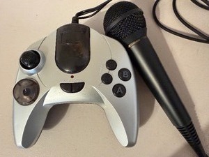 lot 502 image: Poloroid 15-in-1 Gaming Device and a Microphone