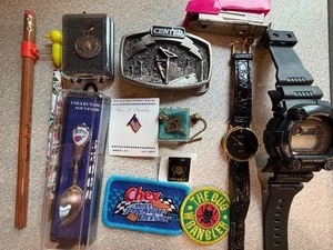 lot 18 image: Souveniers, Watches, Pins and More