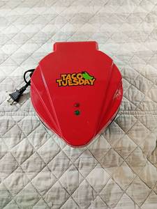 lot 31 image: Taco Tuesday Electric Taco Shell Maker
