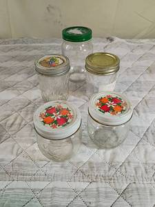 lot 69 image: Decorative Glass Mason Jars with Pattern Lids