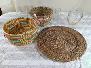 lot 73 image: Baskets, placemat and glass decor