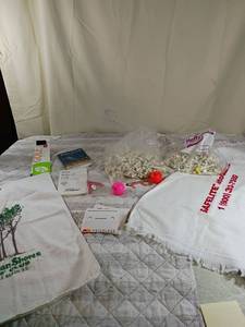 lot 76 image: Golf items and bags of golf tees