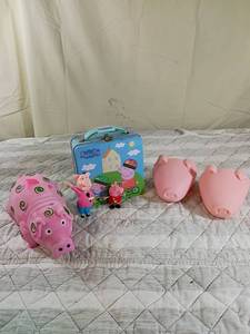 lot 83 image: Peppa Pig Toys and Lunch Box Set