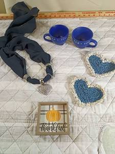 lot 122 image: 2 Tea Time Cups with Heart Necklace on garment2 pot holder and thankful sign