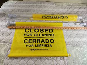 lot 125 image: Amazon Commercial Bilingual Cleaning Sign with Extendable Pole 30 inches to 60inches wide adjustable