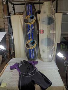 lot 134 image: Gotcha Girls Wetsuit and Black Widow Wakeboard Set and another wake board with foot pieces.