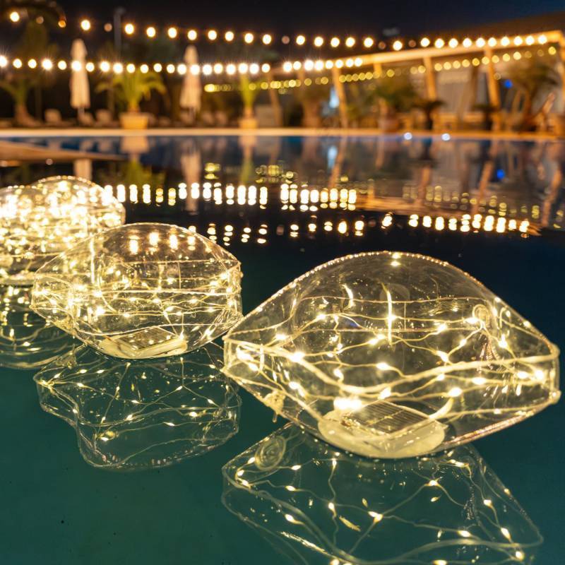 lot 44691 image: Starfish Solar Floating Pool Lights - 14 Star Lights Outdoor for Pool Decor, Inflatable & Hangable Outdoor Star Light, Waterproof Pool Decorations - Best Gifts for Pool Owners (2 Pack Warm) - Retail $33