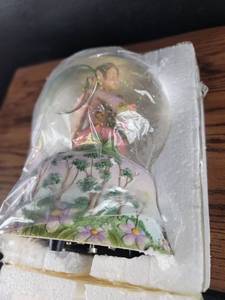 lot 3605 image: Hand-Painted Garden Scene Snow Globe