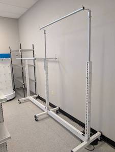 lot 15 image: Commercial Grade Rolling Garment Rack Display  - Retail $285