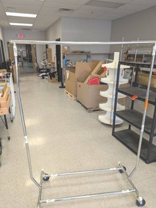 lot 38 image: Folding Commercial Chrome Clothing Rack with Wheels  - Retail $75