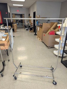 lot 39 image: Folding Commercial Chrome Clothing Rack with Wheels - Retail $75