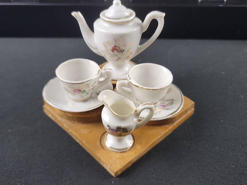 lot 3553 image: Miniature White Porcelain Tea Set with Floral Design