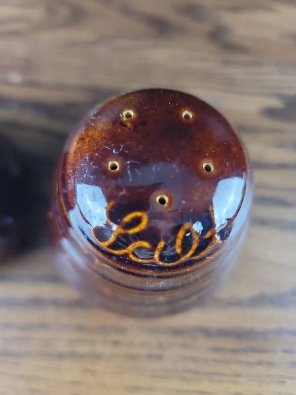 lot 3838 image: Brown Glass Salt and Pepper Shakers