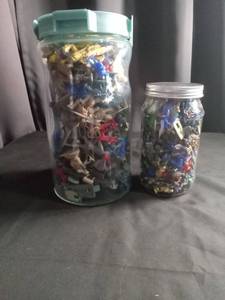 lot 2314 image: Mixed Plastic Army Men Collection in Glass Jars