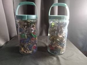 lot 2318 image: Mixed Lot of Small Plastic Toy Figures in Storage Jar