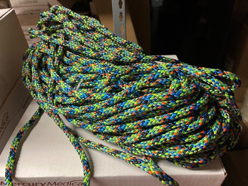 lot 71 image: Braided Bungie Type Rope - 60 Great for Utility Rope on a Boat - Use for Towing Tubes, Tying off docks Etc - Green