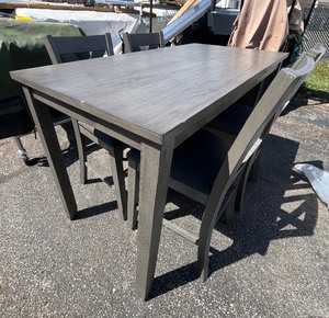 lot 153 image: Utility Dining Table & Chairs - Great for Studios or Apartments - Built in 3 Tier Shelving Unit - 4 Chairs W Cushion - See blemishes in images comes as is