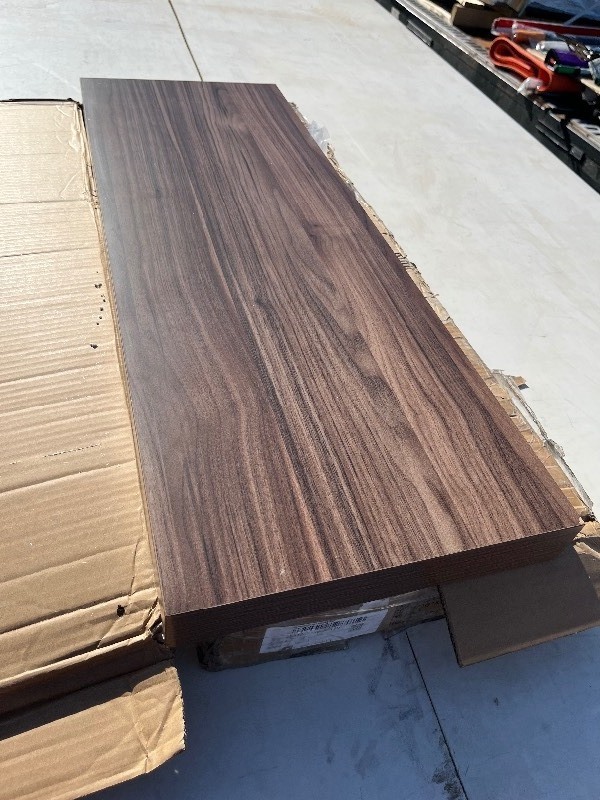 lot 10 image: Floating Shelve W Bracket - Walnut Styled comes as Pictured not perfect 36 x 12 x 2