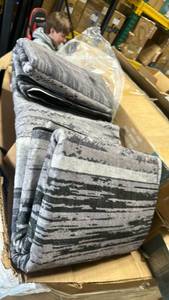 lot 28 image: Nayoroom Machine Washable Rug 8x10 BlackGrey Only opened to see what rug looks like