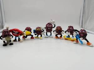 lot 101023 image: Vintage California Raisins Characters & Tang Lips Figures - Collection of 8 (1980s) by Applause