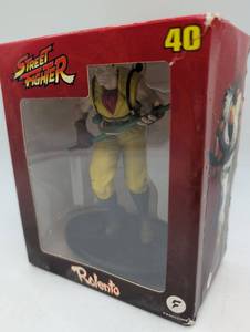 lot 101042 image: Street Fighter Rolento Action Figure #40 by Fanhome, in box