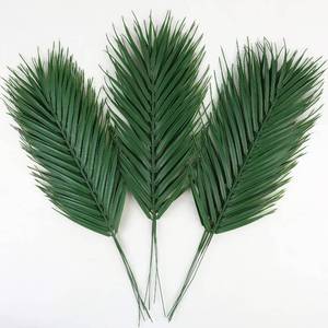 lot 58719 image: CCINEE 16 PCS Artificial Palm Leaves, Faux Large Palm Fronds Fake Tropical Plant Simulation Safari Leaves with Stems for Home Hawaiian Luau Party Jungle Beach Theme Party Decoration - Retail $18