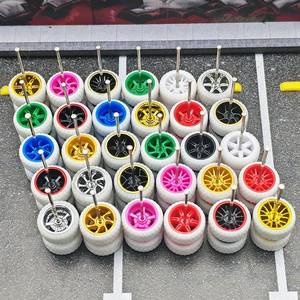 lot 58754 image: WAVEIST 164 Wheels and Tires Real Rider Series Mixed 10 sets of White Wheels.(10 Mixed White Wheels) - Retail $22