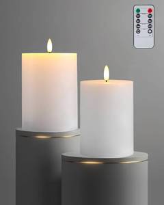 lot 50084 image: 3x4 Flickering Flameless Candles with Remote Timer, 3 Diameter White Pillar, Real Wax, Set of 3 Large Battery Operated LED Candles for Table and Fireplace Decor (H 4) STOCK PHOTO APPROXIMATE - three candles
