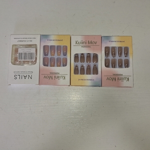 lot 57053 image: 4 PACKS OF FINGER NAILS