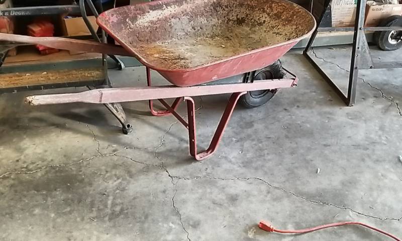 lot 10 image: 4 Cubic Foot Wheel Barrow- True Temper