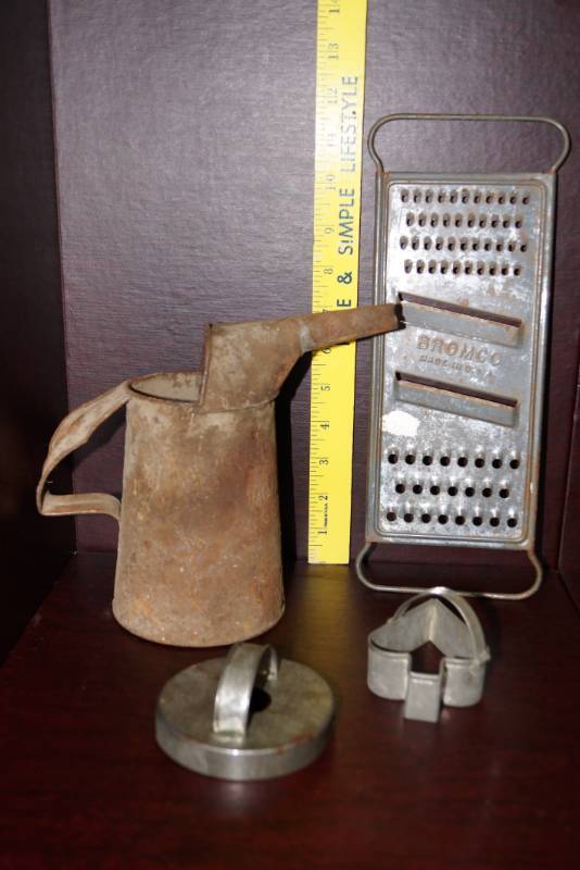 lot 521 image: Antique BiscuitCookie Cutters , Grater and Very Old Watering Can