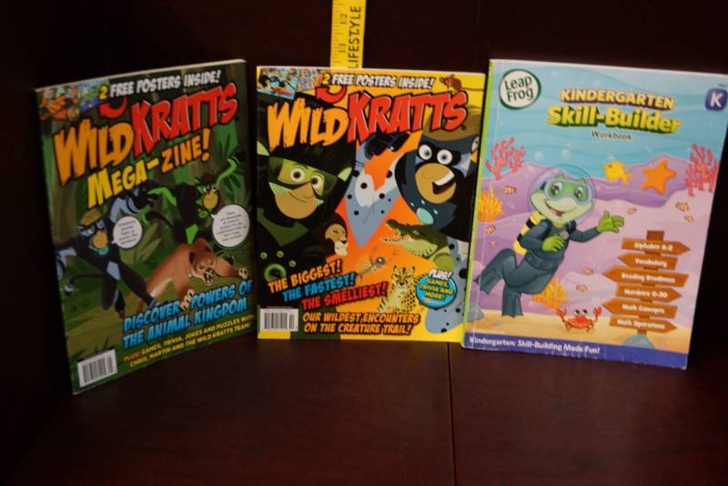lot 532 image: 2 Kids Wild Kratts Mega-Zines & a Kindergarten Leap Frog Workbook