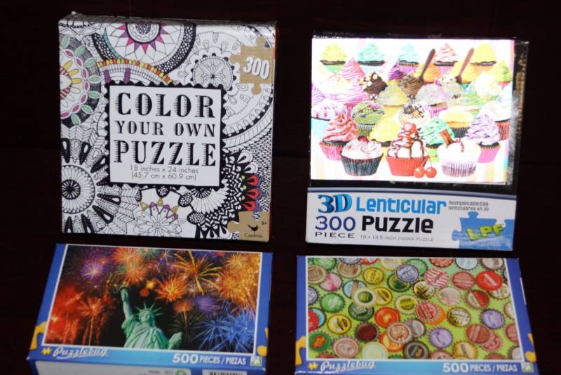 lot 580 image: 4 Puzzles  300 & 500 Pieces  Including a Color Your Own Puzzle