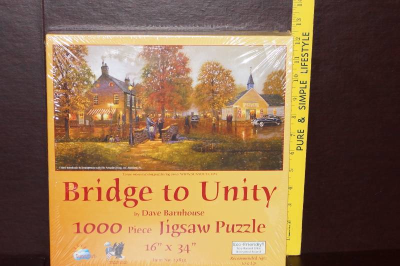 lot 587 image: NEW 1,000 Piece  Bridge to Unity  Puzzle